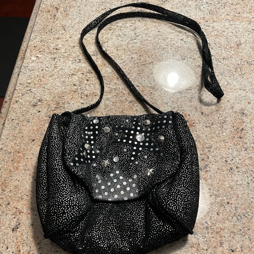 So attractive!  Small shoulder bag black /ornate with stones/snap closure.